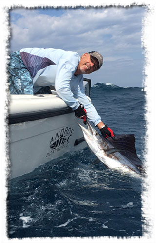 Captain Mario Cote catching a sailfish